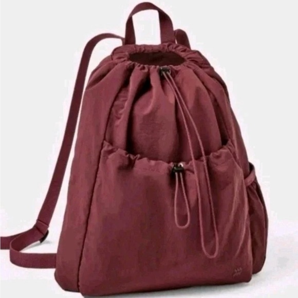 all in motion Handbags - All In Motion 20L Cinch Pink Backpack Water Repellent Softside